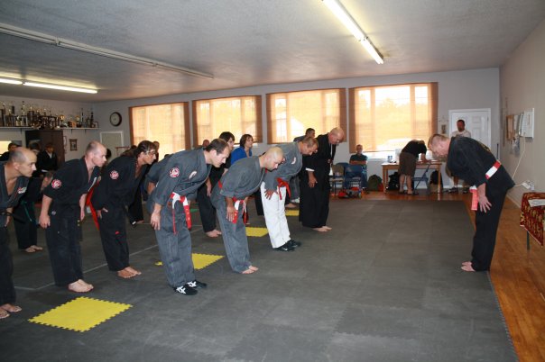 Master and Class bow to the Newly promoted master as a show of respect
